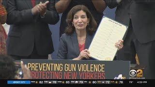 Hochul signs 10 bills to combat gun violence into law