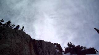 jumping off the little cliff at Alta, Utah skiing