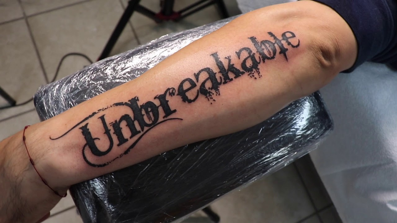 Unbreakable Script Tattoo