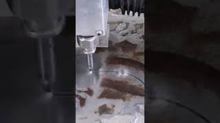 Desktop Waterjet cutting a Batarang