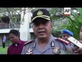 Indonesia police reconstruct murder scene