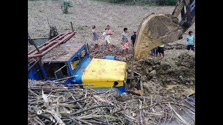 Sugarcane truck stuck on the mud