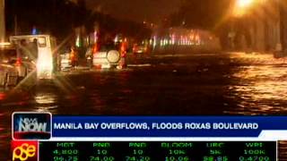 Manila Bay overflows, floods Roxas Boulevard