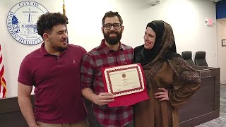 Dearborn Heights restaurant worker honored for saving man trapped in burning car