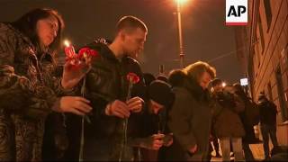 Raw: Putin Lays Flowers At Russian Blast Scene