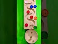 Tiny Glass Marbles Reversely Going Upwards Along Button Curves