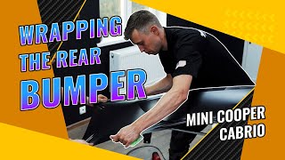 Wrapping the bumper of Mini Cooper Cabrio with satin vinyl film