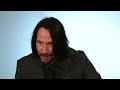 Keanu Reeves Plays With Puppies While Answering Fan Questions