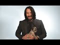 Keanu Reeves Plays With Puppies While Answering Fan Questions