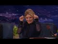 elisha cuthbert slept next to tom selleck on a plane conan on tbs