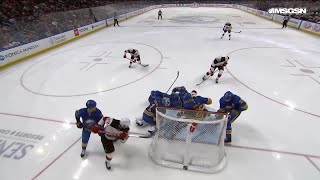 Paul Cotter scores a goal against the Buffalo Sabres