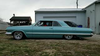 Bagged 1963 Chevy Impala  283 v8 automatic.  Mostly original.  Riding on air.  Hitting Switches