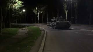 T72 tank driving over PFM 1 anti personnel petal mine to clear the road