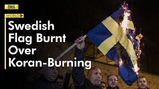 Protesters burn Swedish flag in front of embassy in protest against Koran burning | DNAIndiaNews