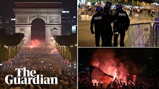 Riot police fire teargas at unruly France fans celebrating World Cup final place