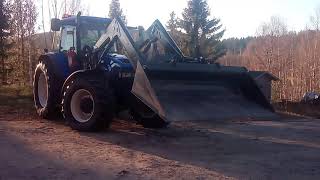 Hauer front loader with optional tilt attachment