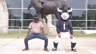 Mascot "Toro" From The Texans Dances With Tio Choko