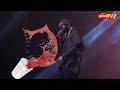 Eddy Kenzo Hits Fan With Mic After Fan Pours Him Liquid Substance On Stage