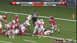 Atascocita's T.J. Thomas flys through the air on this touchdown. 7-0 over South Houston