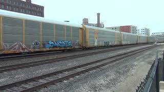 BNSF #6952 Leads WB Autoracks. Kansas City, MO 12/28/24