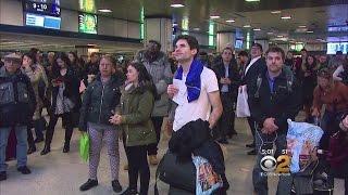 Passengers Crowd Penn Station