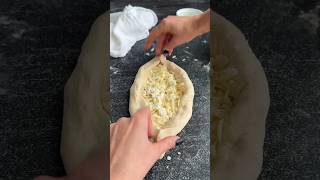 Khachapuri (known as cheese boat in America) is a traditional Georgian dish. Details in description.