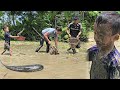 How to catch giant fish in the mud with your family