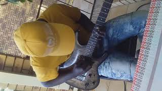 Thabelo Mufamadi playing rhythm guitar on MUKUKULUME ENTERTAINMENT