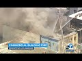 Firefighters battle large fire at commercial building in downtown LA