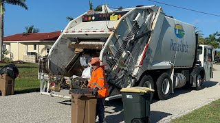 Pac-Tech Extreme Duty Rear Loader Garbage Truck on a Crew Cab Battle Motors Raider Packing Trash