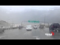 INCREDIBLE FOOTAGE Sign blowing around on Deerfoot