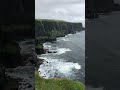 Hiking all the way to the top of the Cliffs of Moher in Ireland