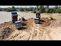 Massive Swamp Landfill Big Pond Bulldozer Pushing Clearing Dirt Into Water Dump Truck Unloading Dirt