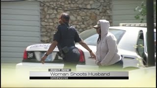 Woman shoots husband