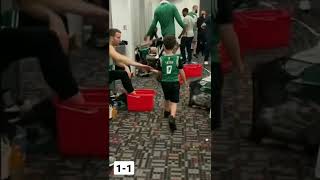 YOUNG TATUM cheers up boston celtics player with high five after winning in game 2 against heat.