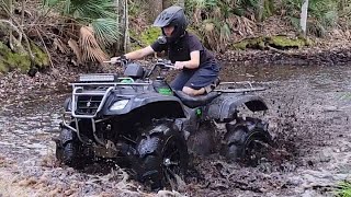 Suzuki eiger 400 gets cut 32 inch tires!! (This fourwheeler is unstoppable!)