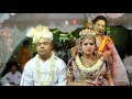 Manipuri wedding - Bride and groom sit at wedding mandap