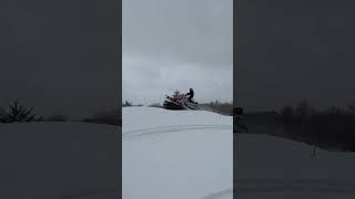 Ski doo freeride with can hits jump