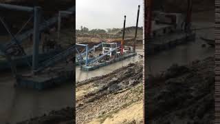 JULONG 20 inch cutter suction dredger is dredging a channel in Bangladesh with work boat