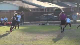 Soccer referee tripping player