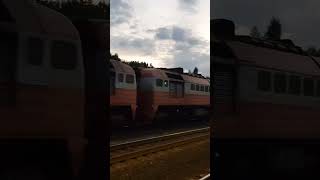 Diesel locomotive 2M62K-0565 with a freight train #2m62k