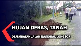 Hujan deras, tanah di jembatan jalan nasional longsor