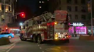 FDNY LADDER 25 RESPONDING ON WEST 77TH STREET ON UPPER WESTSIDE AREA OF MANHATTAN IN NEW YORK CITY.