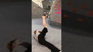 Woman Takes Up Hip Mobility Challenge While Balancing Pouch on Her Sole - 1289571