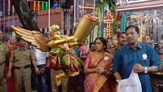 Uppiliappan temple. Doll showering flowers upon God.