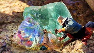 Emerald and opal embedded in volcanic rock. Hunting gem stones. Diamonds, jewelry