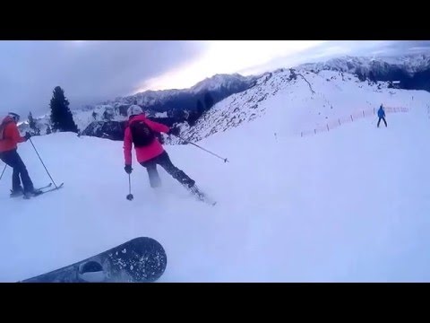 Crazy Woman Crashes into Snowboarder and Skier Crazy Woman Crashes into Snowboarder and Skier
