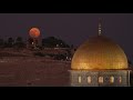 Super Blue Moon rises behind Jerusalem's Dome of the Rock | AFP