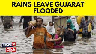 Gujarat Floods: Heavy Rains Lash Several Parts Of Gujarat, Red Alert Issued | Gujarat Rains | News18