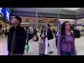 walking in the new penn station new york city 2024